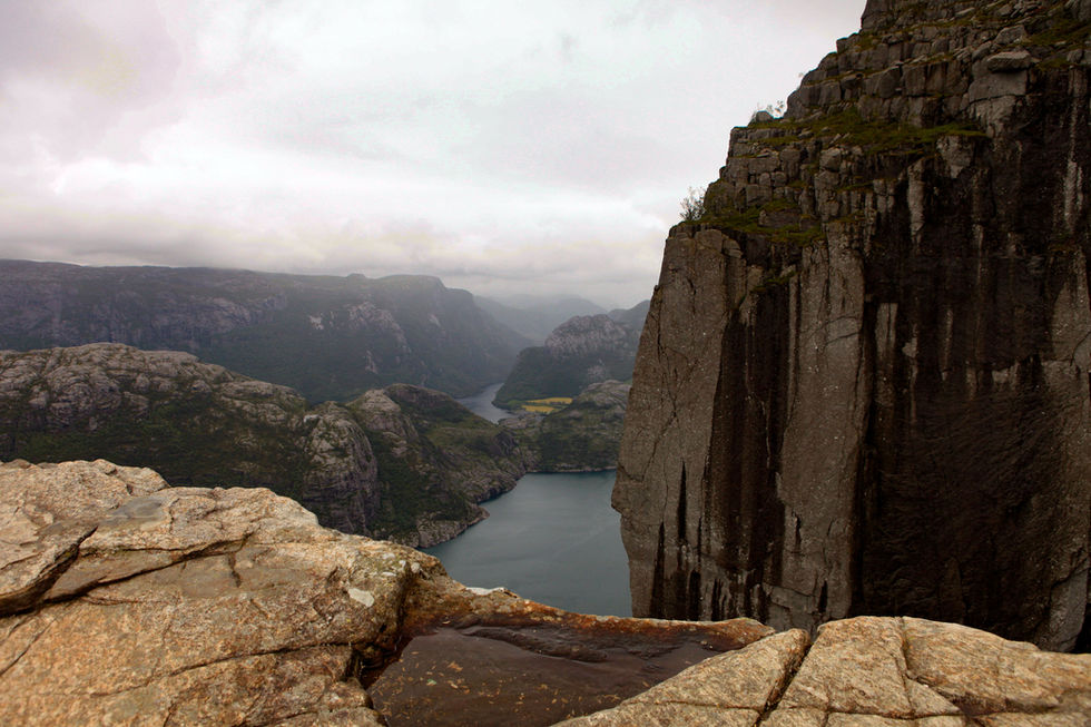view-from-cliff-preikestolen-fjord-lysefjord-norway-nature-travel-background-vacation-concept-granite-rocks-mountains