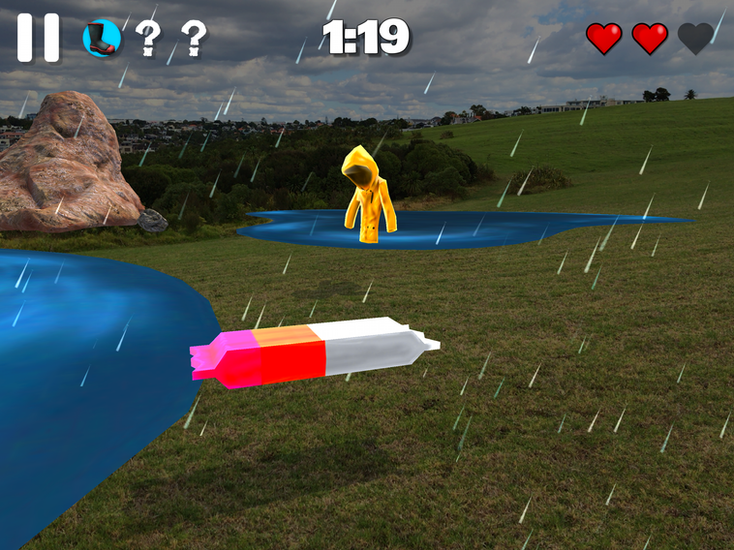 What's the Plan Stan emergency preparedness game flood scene showing a raincoat and battery collectible items floating in rising floodwater across a grassy field during heavy rain