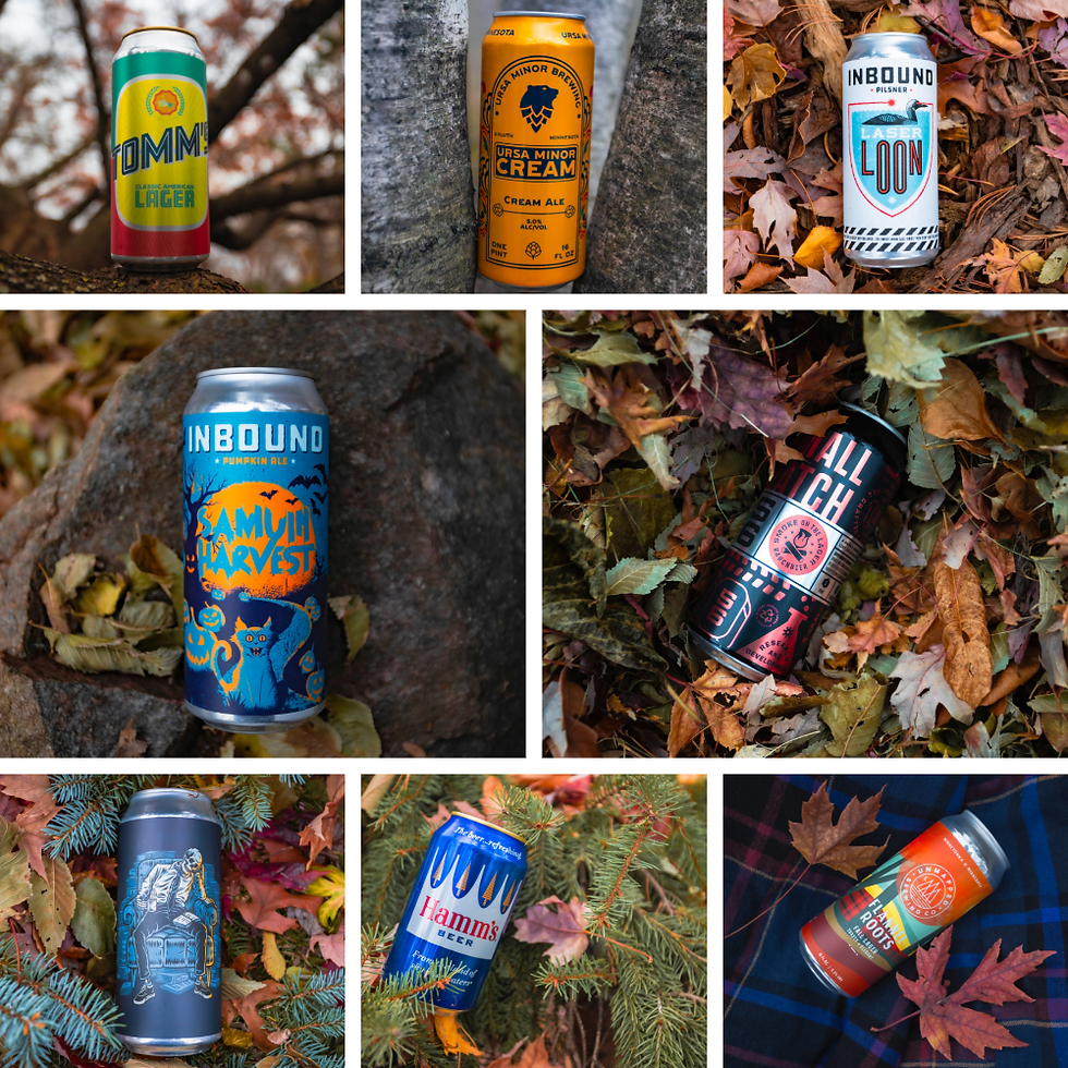 Assorted beer cans with colorful designs placed among autumn leaves and trees, featuring visible brand names like Ursa Minor and Inbound.