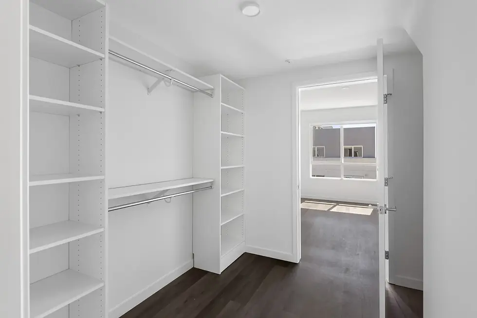 ruby_-_townhome_walk-in_closet.jpeg.webp