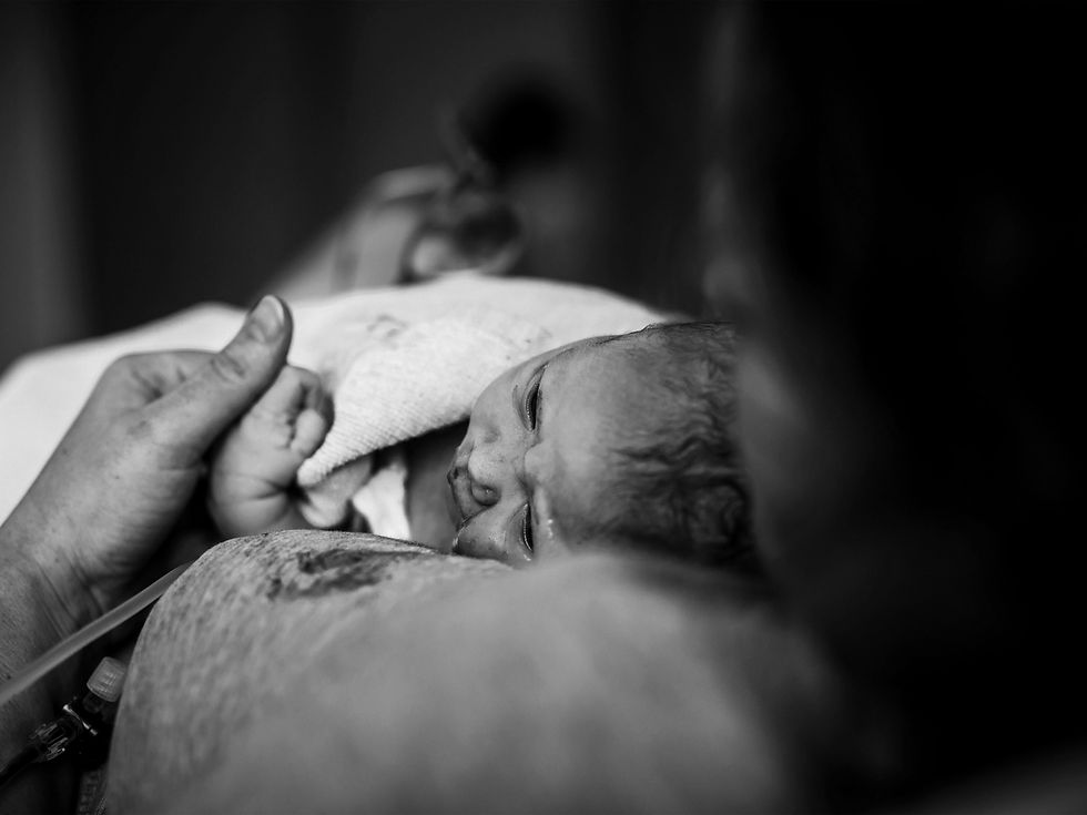 Neonato e genitore