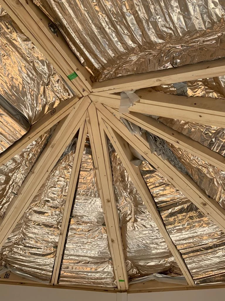 Timber structure and insulation beneath a tiled conservatory roof, from the warm-roof gallery