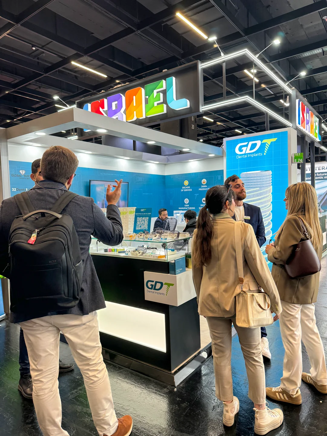 Visitors talking with the GDT Team at the GDT booth - IDS Cologne 2025