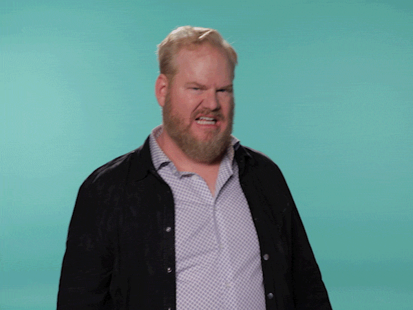 Guy with a beard yawning