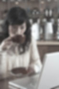 Woman Sipping Coffee