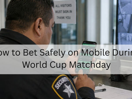 Security guard using a smartphone for live football betting while monitoring CCTV screens at a security desk.