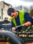 man working on a engine
