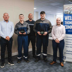 Thomas Hardie staff standing alongside Thomas Hardie Apprentice Technicians
