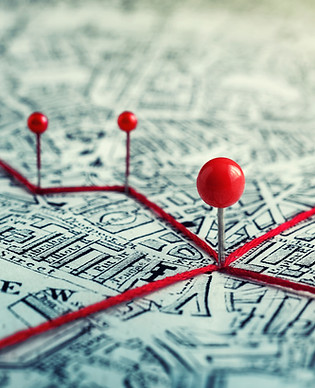 Routes with red pins on a city map. Concept on the adventure, discovery, navigation, comm