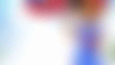 A young woman with a Haitian flag