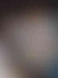 man serving food at a marquesita food stand in downtown Holbox Mexico