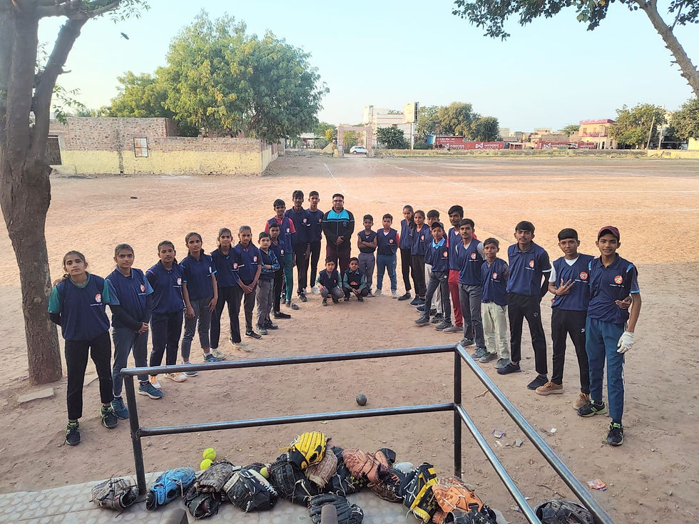 After Receiving T-Shirt Student who Play Softball in Basni Belima along with Coach Ram Murti G.