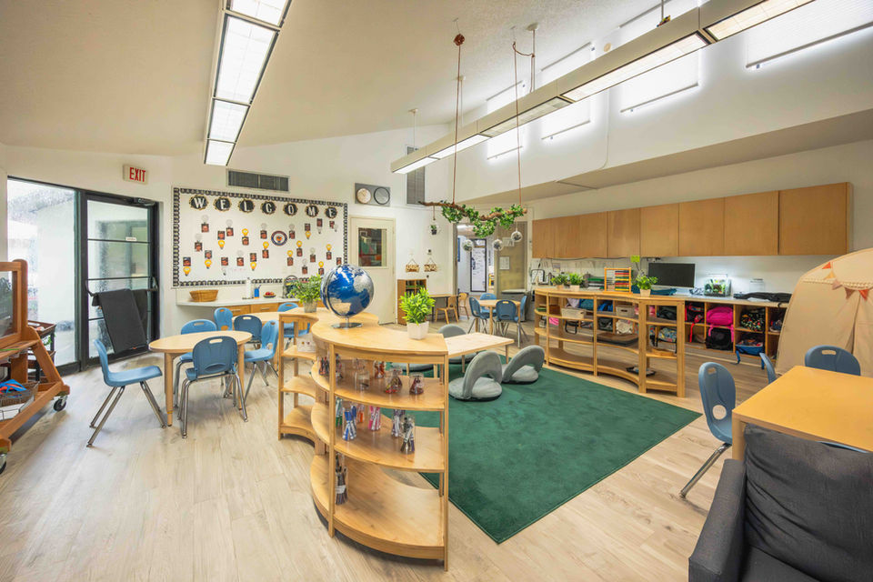 Early childhood classroom at Temple Sinai with learning centers and play-based educational spaces.