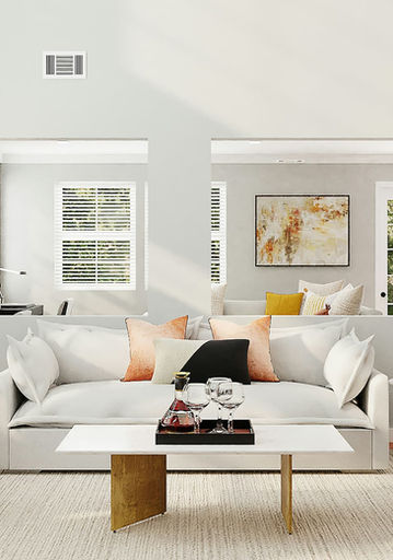 Modern living room design with orange chairs and white sofa