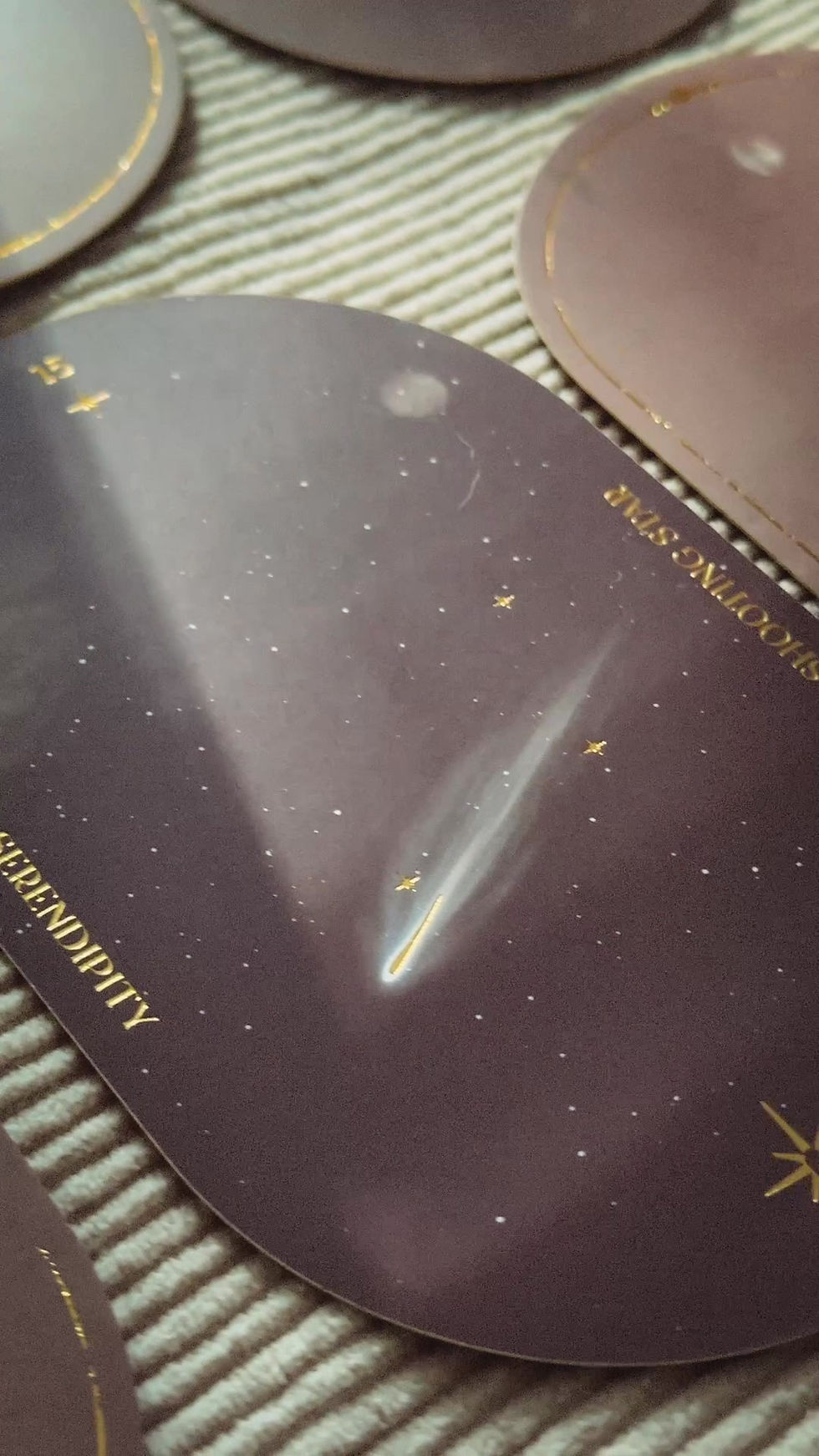 Thumbnail: Cosmic starry design on the back of a Glyph oracle card