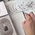 Thumbnail: Video thumbnail of hands doing a card reading with the circular Accurate AF tarot deck