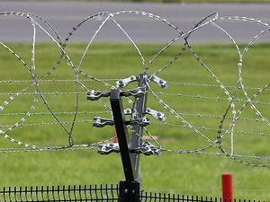 Electric-Fencing-vs-Razor-Wire-960x480_edited.jpg