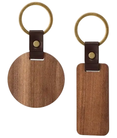 Packshot photography of two unfinished wooden keychains, one round and one rectangular, displayed against a plain black background.