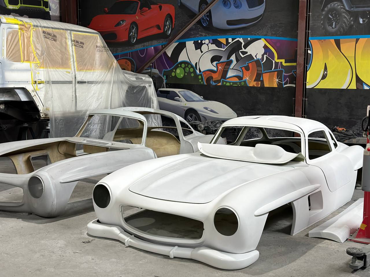 Body for SL300 Gullwing made of reinforced fiberglass.