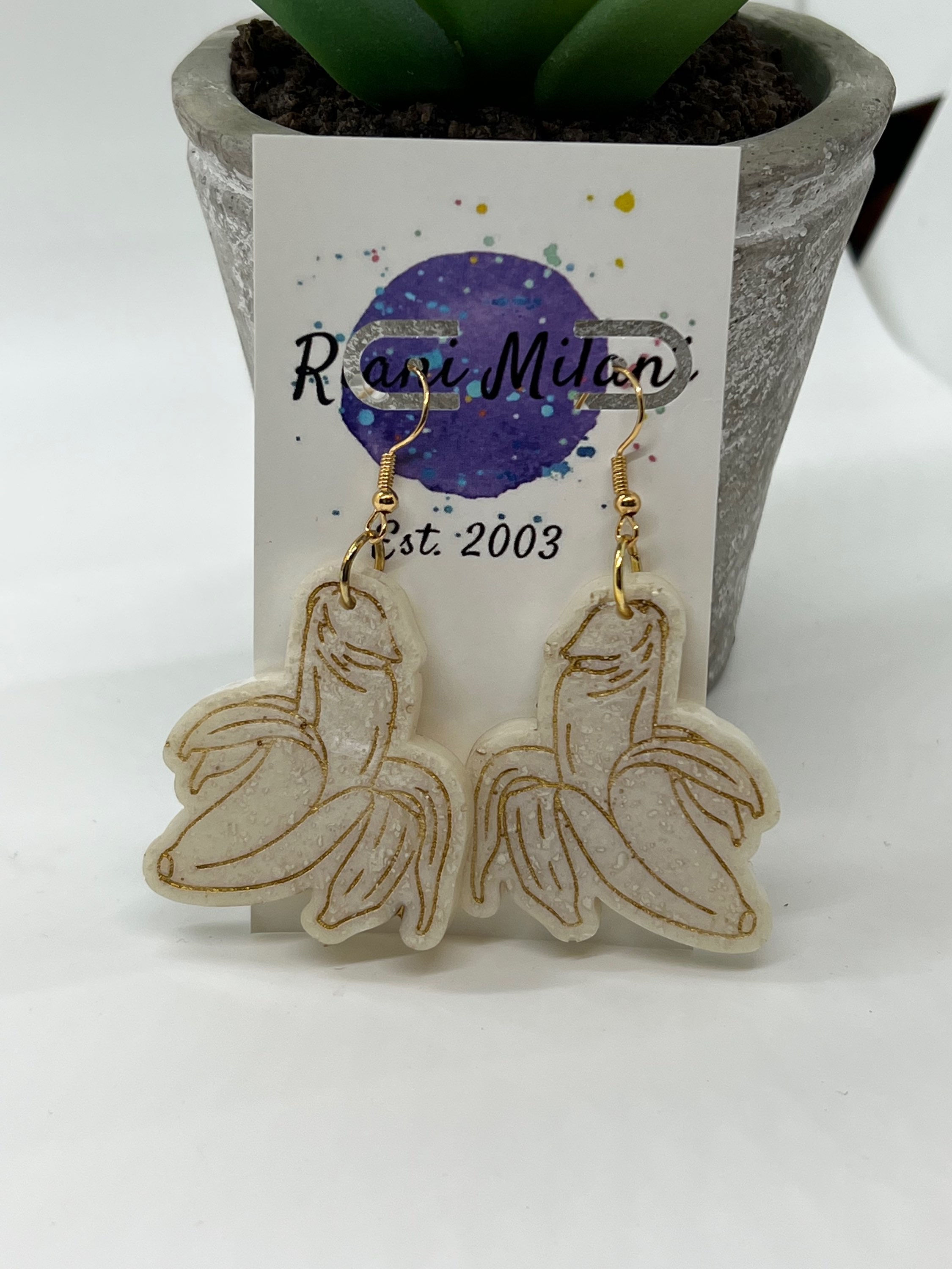 White & Gold Banana Peen resin earrings 