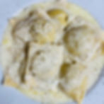 Ravioli ripieni di porchetta