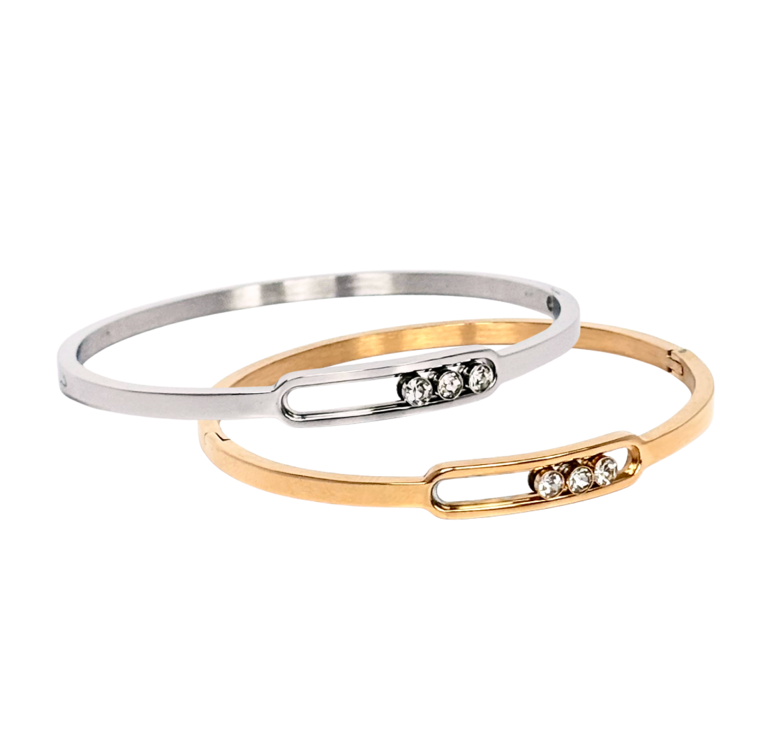 Dita 4mm bangle with shaped bezel and moving stones - Silver