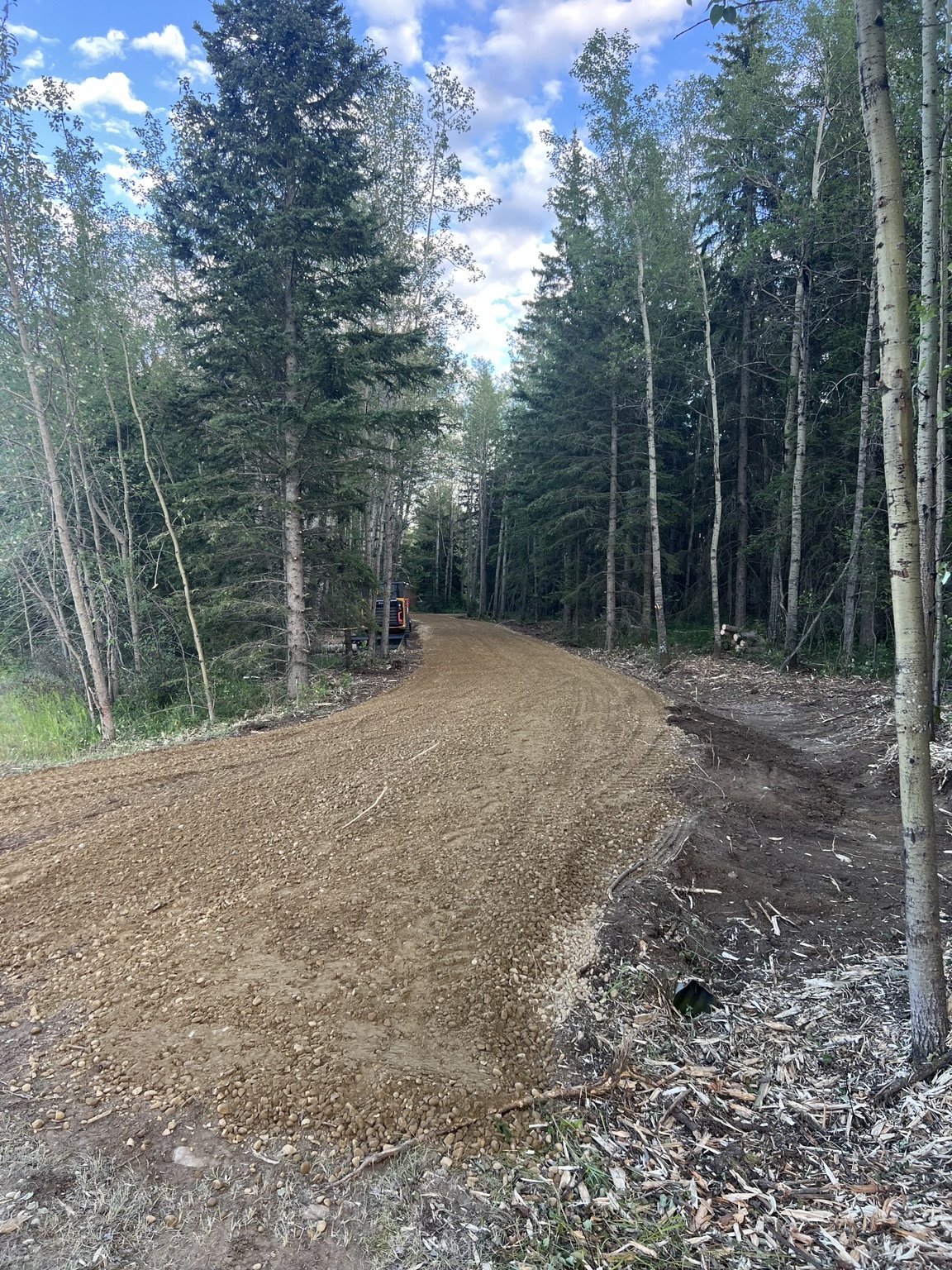Finished rural access road after clearing and site work