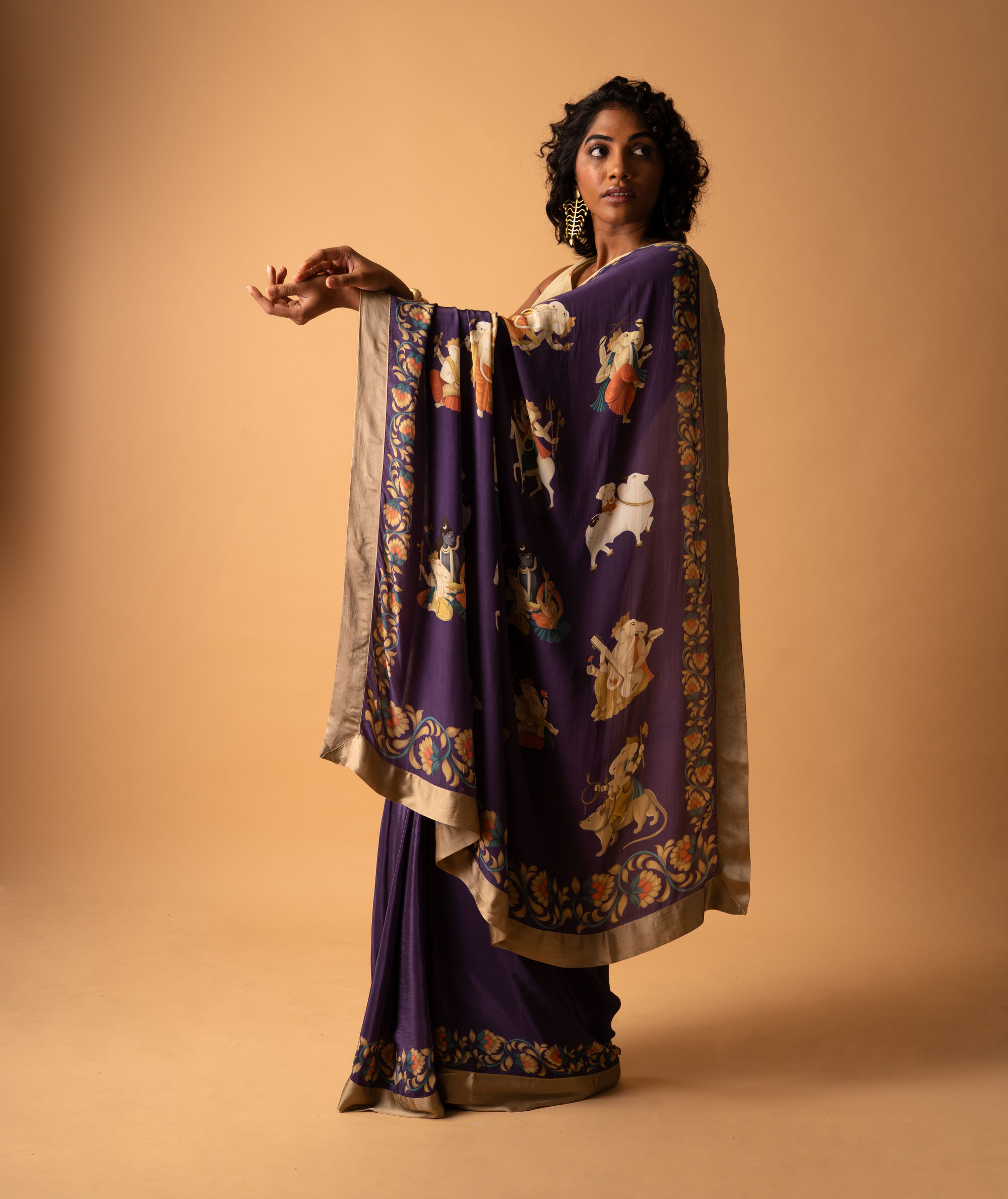 Ganesha mythology-inspired saree featuring hand-drawn Lord Ganesha artwork by Leela