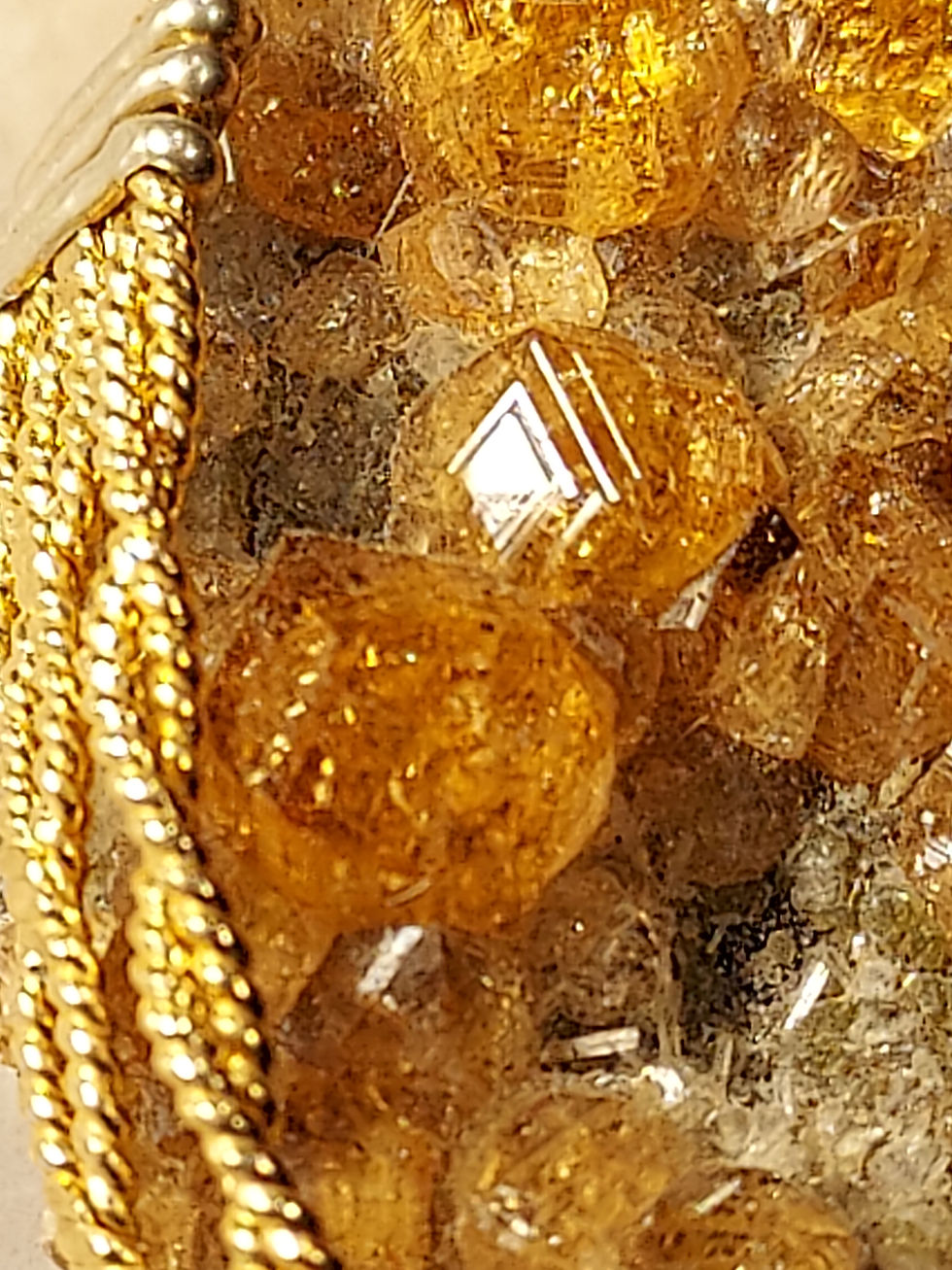 Thumbnail: Grossular Garnets on Matrix Pendant