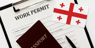 Work Permit Application form with Georgian flag and passport