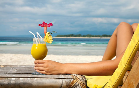 woman-drinking-beach.jpeg