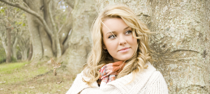 Woman Leaning Outdoors