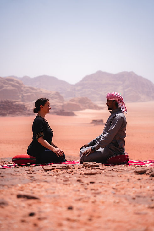 LAURA AND SULEIMAN BEDOUIN YOGA CAMP WADI RUM JORDAN