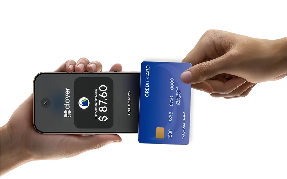 Hands hold a smartphone showing Clover payment for $87.60 while a blue credit card is tapped on a white background.