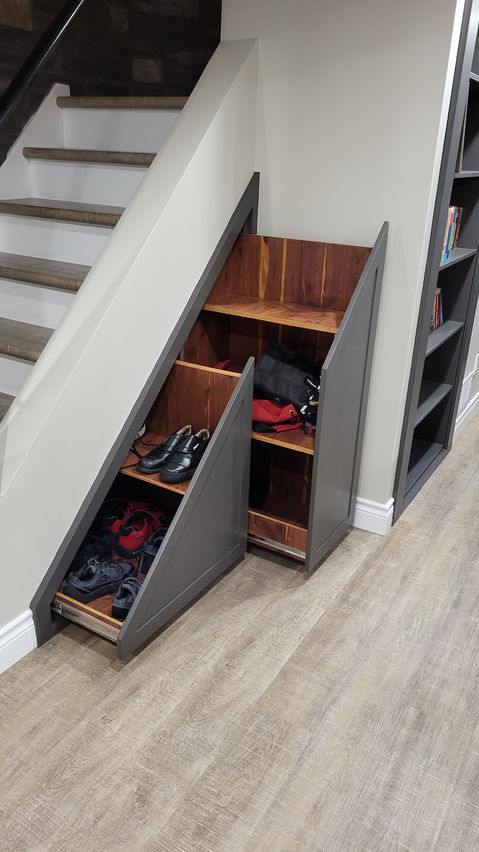custom under staircase storage pull-out drawers