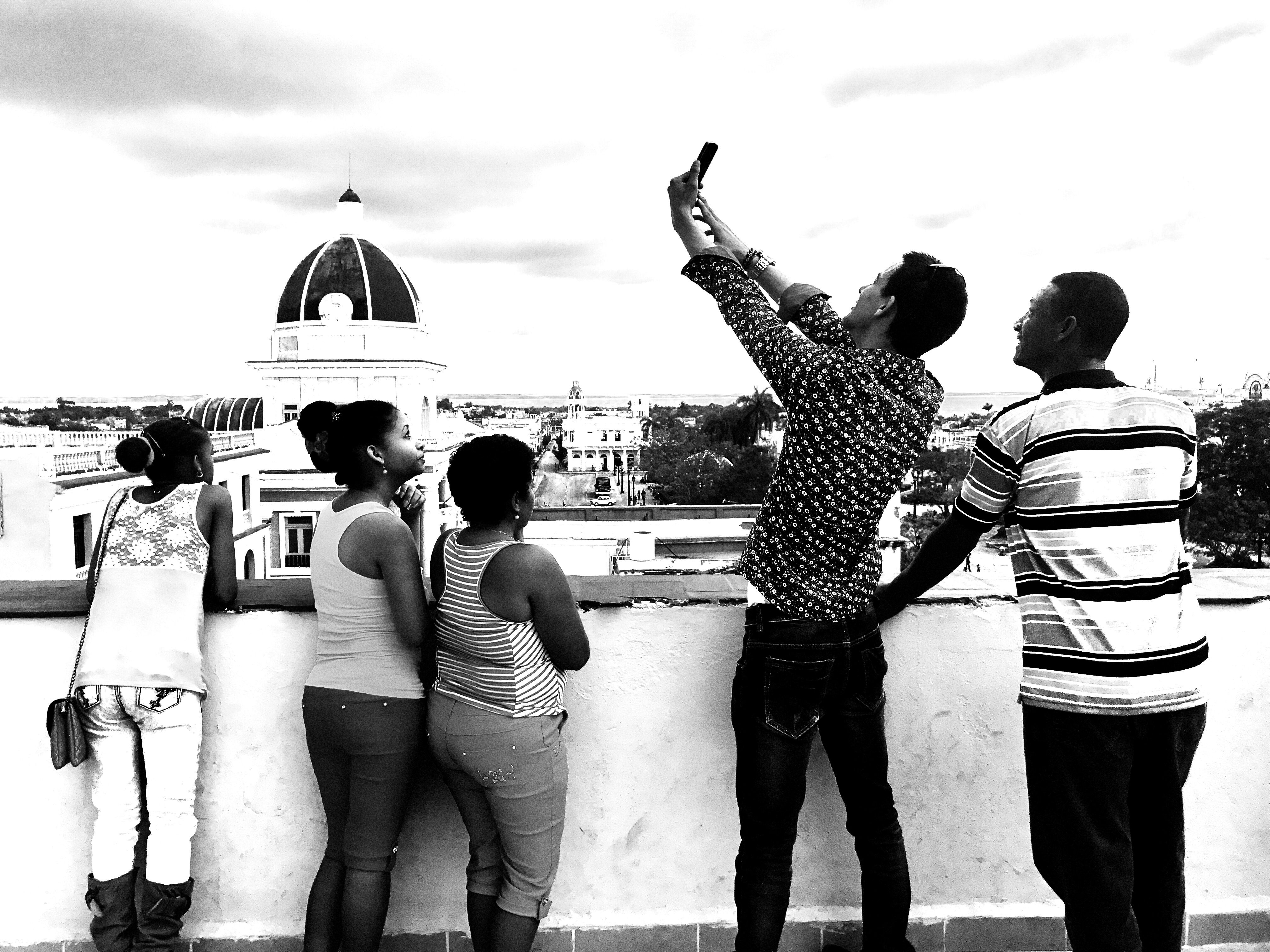 Group Taking Selfies BW