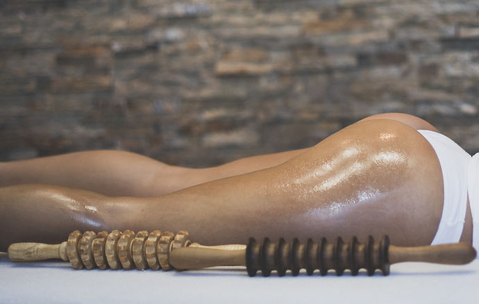 Therapy for your body Woman on anti cellulite massage treatment Close up Copy space.jpg