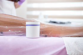 The process of anti-cellulite vacuum therapy with a bag is in progress, and next to the pa