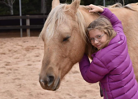 jesse hugs and child.jpg