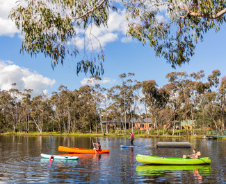Lake with canoes and is stocked with fish annually, Kyneton Victoria