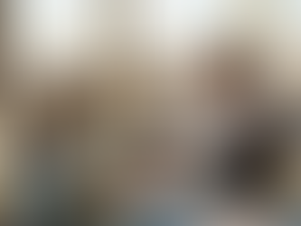 Auditor reviewing statements in corner office