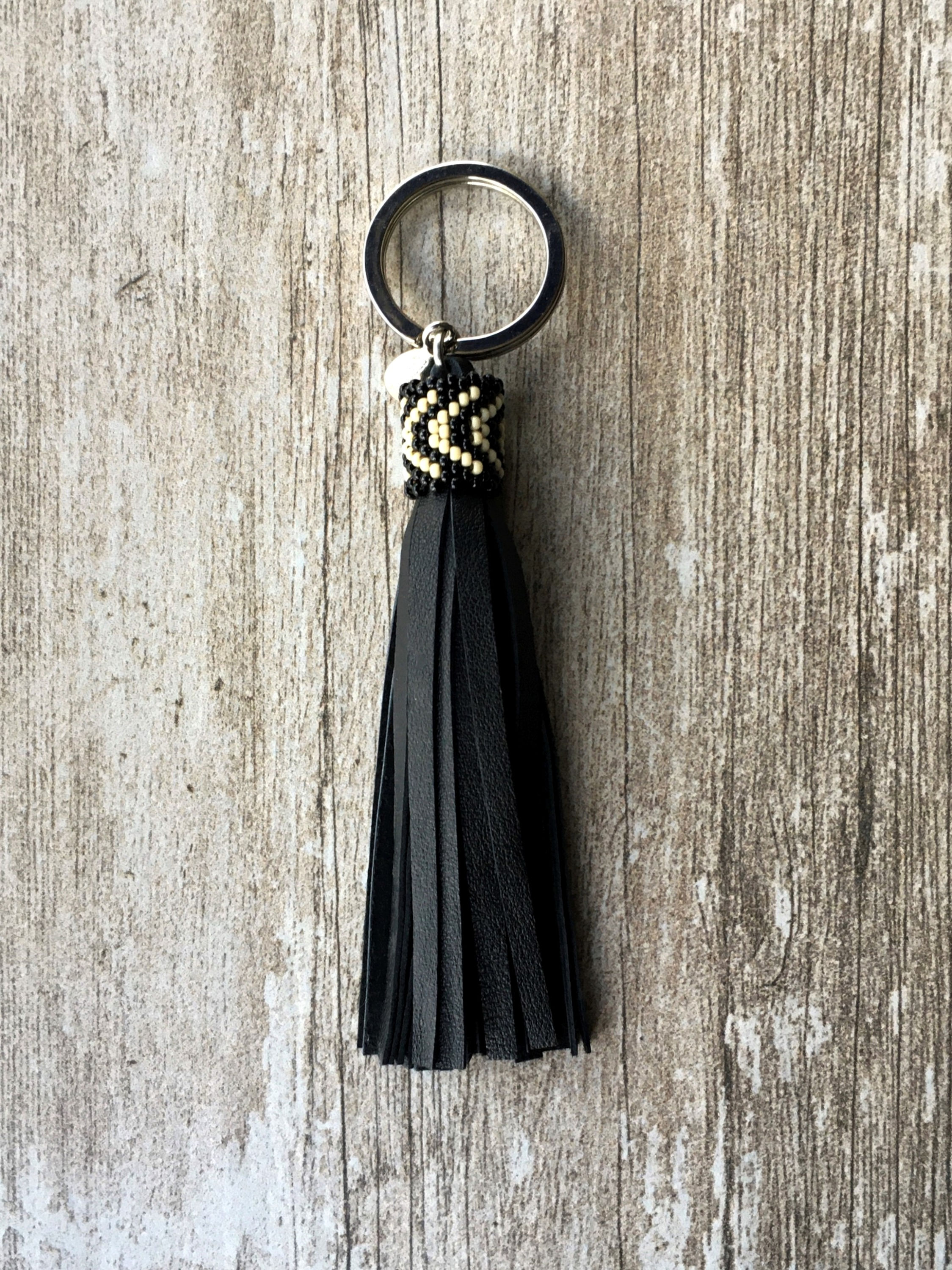 Black leather key ring tassel with zebra design beaded collar