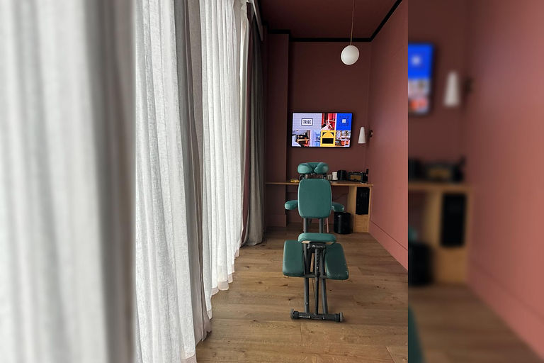 Team massage at corporate events London – fully clothed Shiatsu chair massage for workplace wellbeing