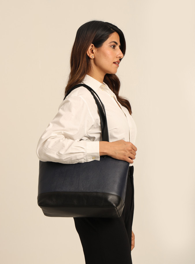 lady holding bag side view