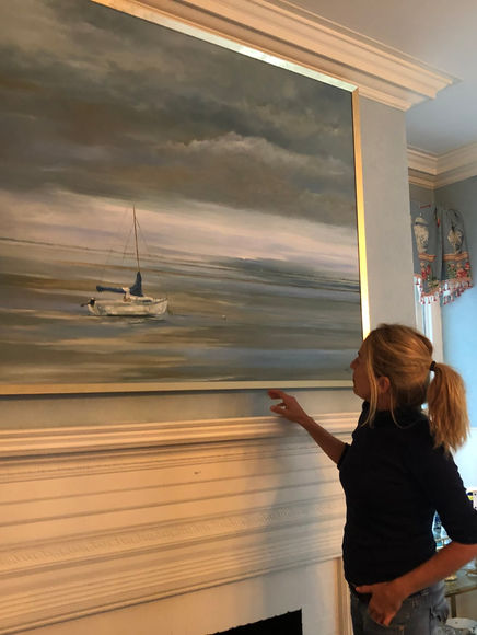 Luba with painting during film shoot, on set of “Rushed” movie