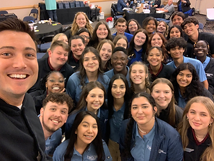 Kyle Willkom smiles with students during the Tennessee State Officer Leadership Training. Kyle facilitates engaging leadership programs across the country each year.
