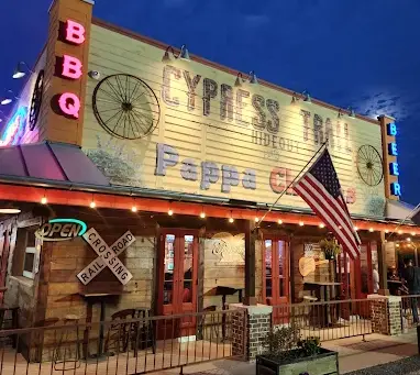 Outdoor patio and historic homestead at Cypress Trail Hideout in Old Town Cypress Texas