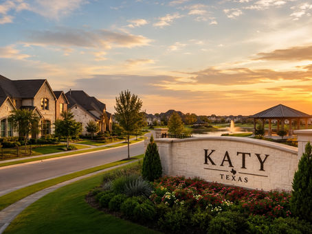 Master-planned community street in Katy, TX with single-family homes, a 2026 buyer's guide from The Barker Group.