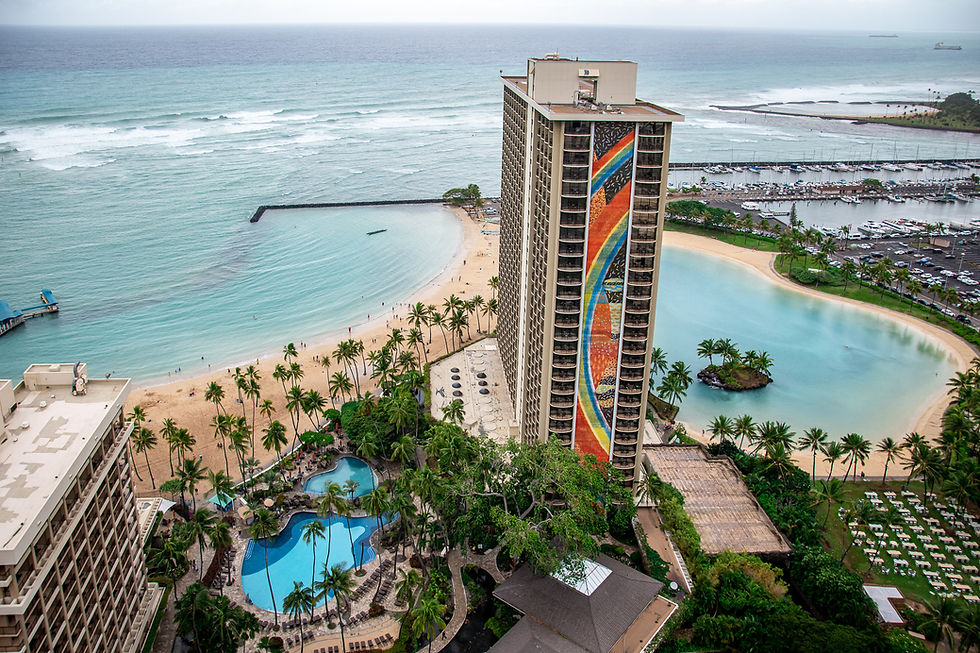 Looking down at the main pool, lagoon, Rainbow Tower and beach at the Hilton Hawaiian Village