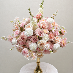 Pink and white roses and flowers centerpieces perfect for wedding decor or any event